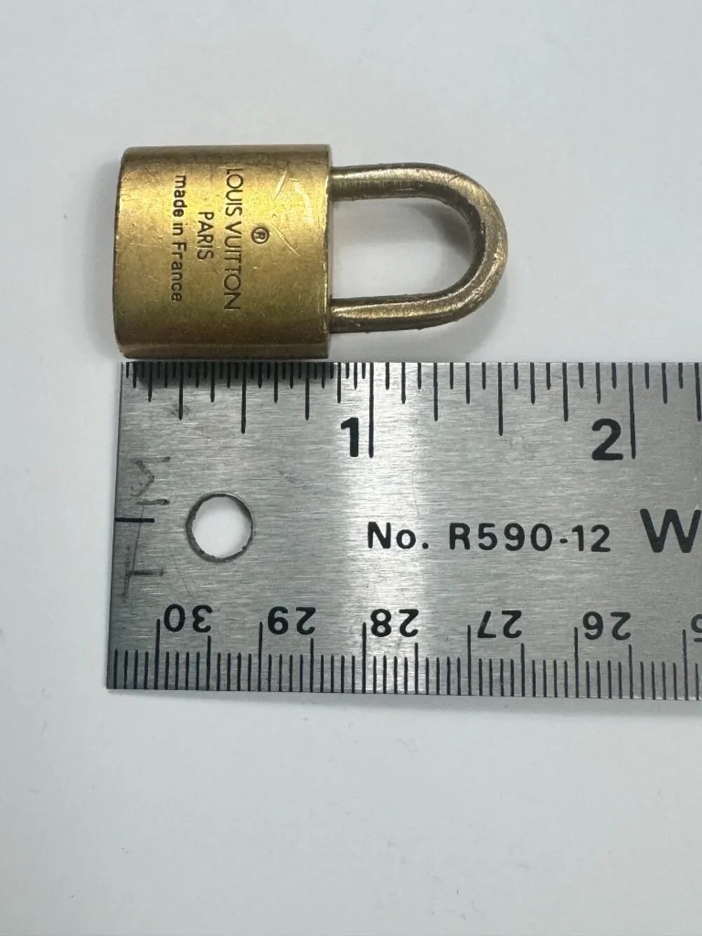 Authentic Louis Vuitton Lock No Key Gold Tone